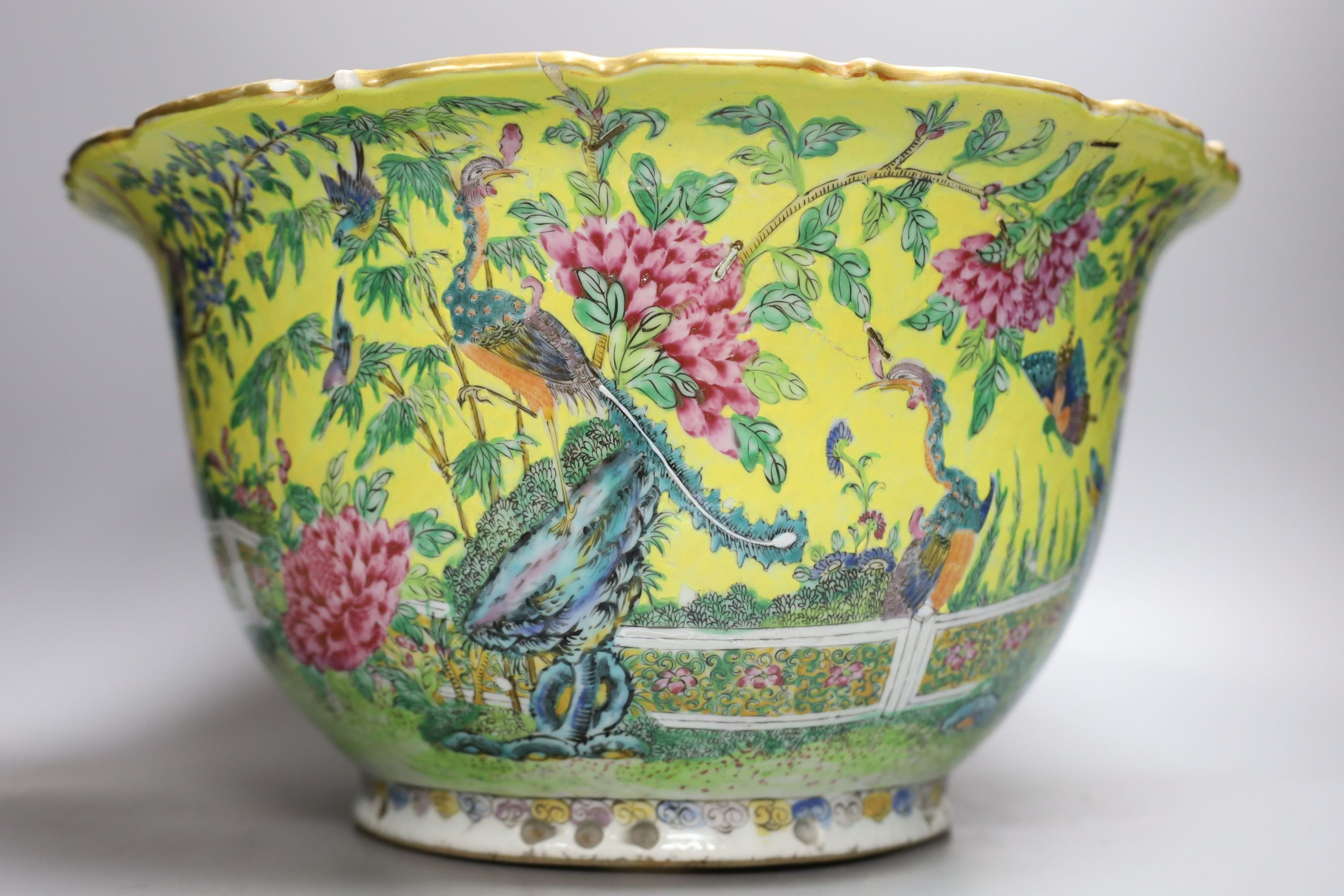 A Chinese yellow ground flower pot, early 20th century, 38cm diameter